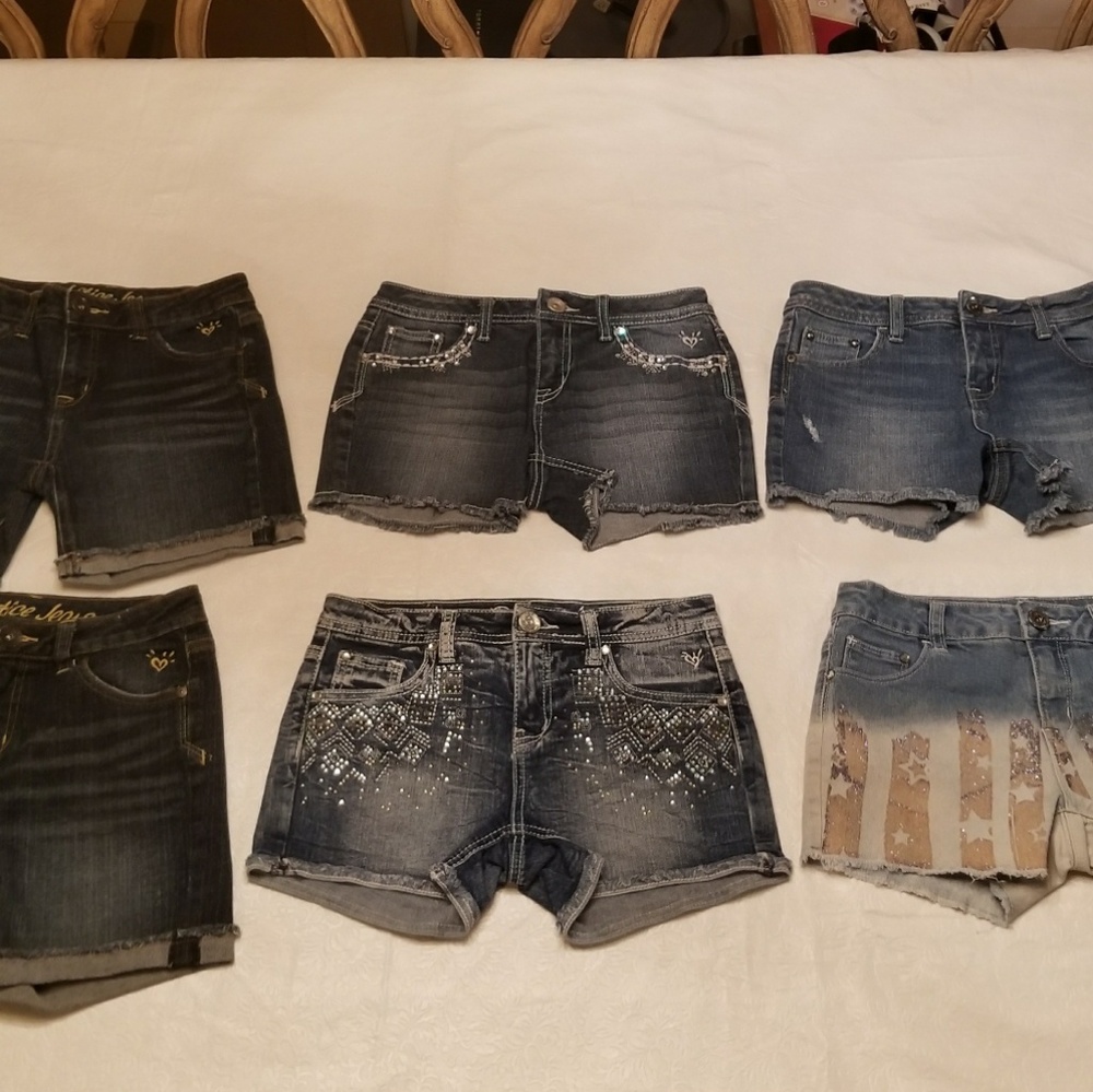 3 pairs of Jean's on the Top row